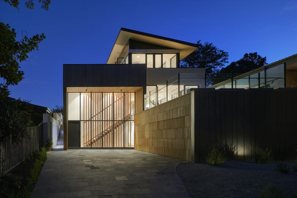 Nocturne Residence - contemporary home lit at night